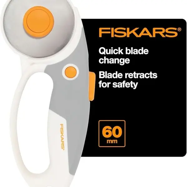 Fiskars 60mm Rotary Cutter for Fabric with Ergonomic Loop Grip And Comfort Handle, Titanium Rotary Fabric Cutter for Thick Materials, Easy and Safe Blade Change, Sewing Supplies and Quilting Tools